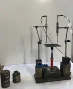 Experimental and numerical investigation on a passive control system for the mitigation of vibrations on SDOF and MDOF Structures: mini Tribological ROCKing Seismic Isolation Device (miniTROCKSISD)